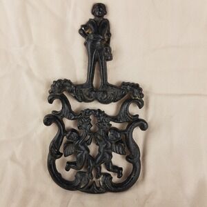 Vintage 1955 Cast Iron Trivet T-11 Cupid Sailor Cherub Black Metal Hot Plate 8.5
